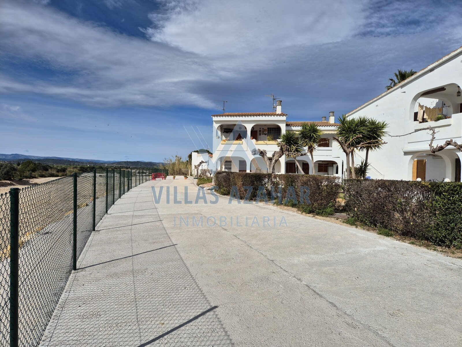 Apartamento en planta baja con jardín de invierno – Urbanización „La Palmera“